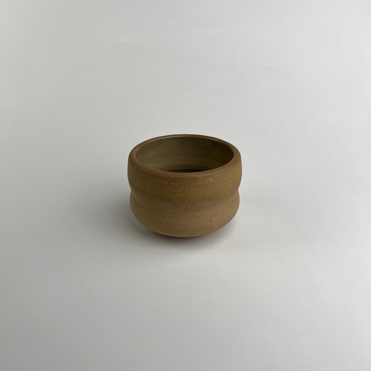 Brown Curved Cup